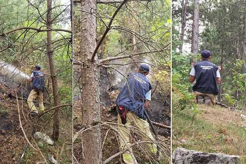 (FOTO) Vatrogasac pao na sedždu i digao ruke prema nebu kako bi se zahvalio Bogu za kišu koja je ugasila požare